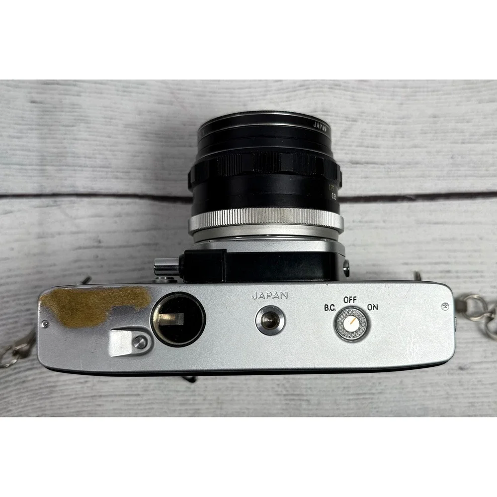 Minolta SRT 101‎ 35mm SLR Film Camera with MC Rokkor-PF 55mm f1.7 Lens Silver